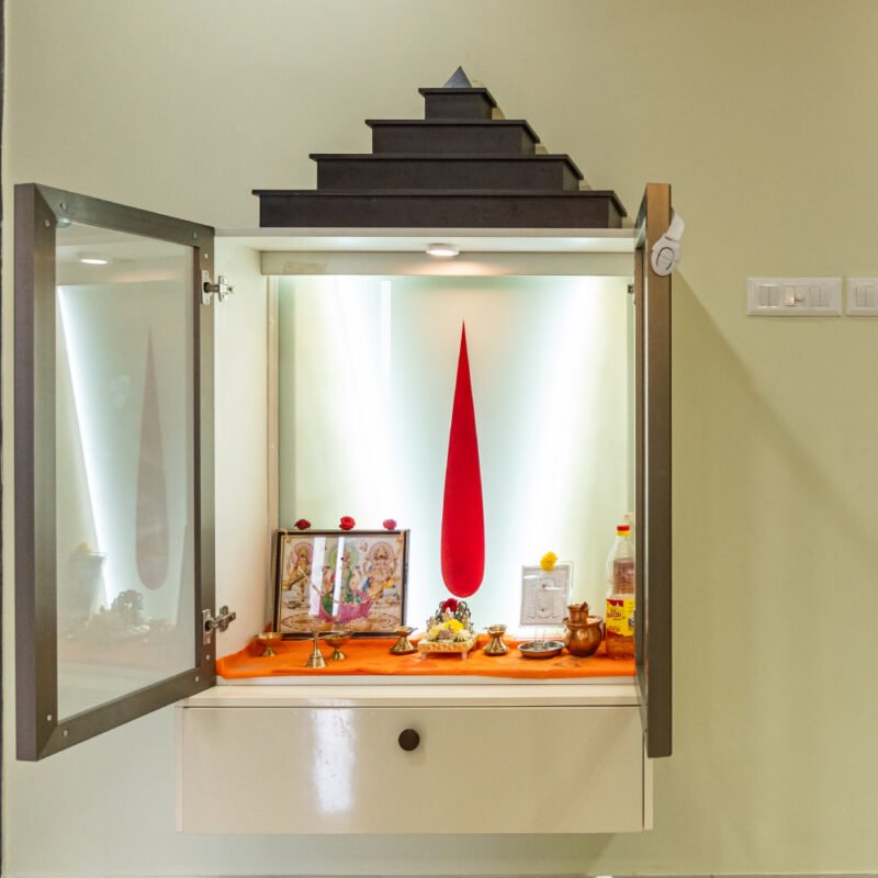 Wall-Mounted Modern Pooja Unit Design in White and Tawny Balsam