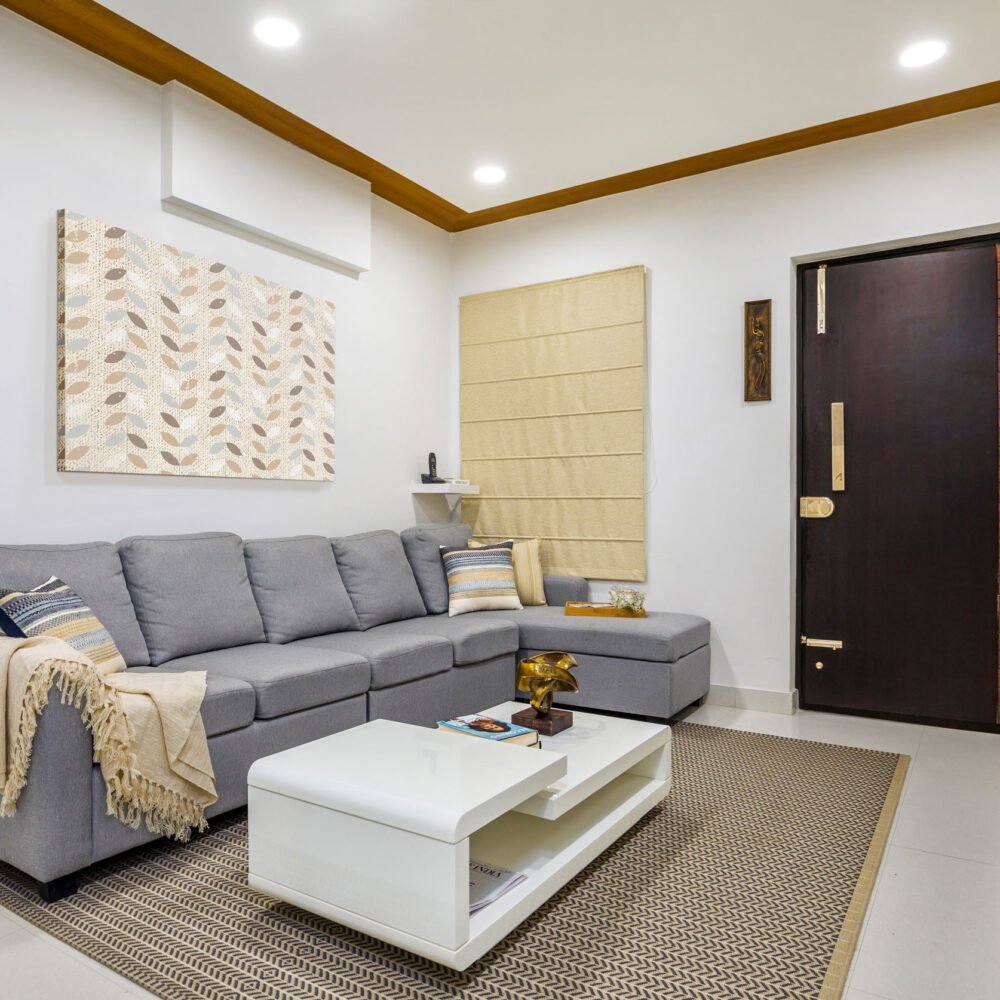 Contemporary Earthy Toned 2 BHK Flat Design with Island Kitchen