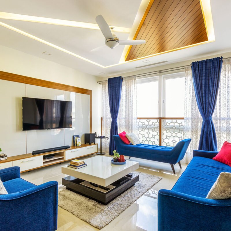 Contemporary 3 BHK Flat Interior Design with Rich Wooden Accents and L-shape Kitchen