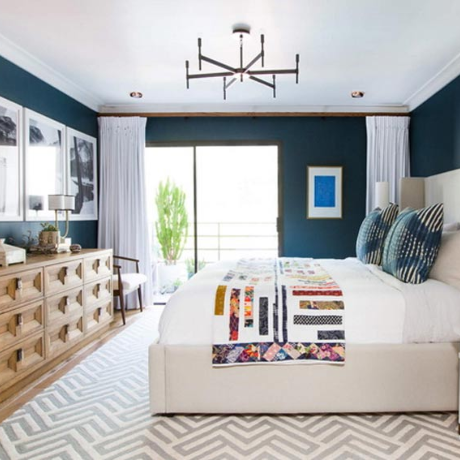 Contemporary Guest Bedroom Design Featuring Built-In Storage and Textured Walls