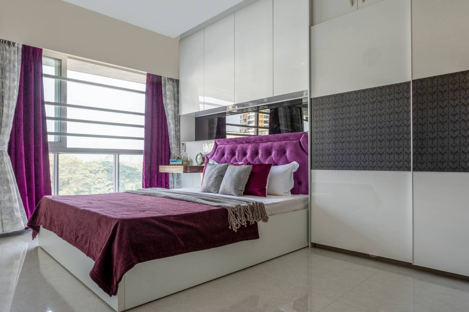 Modern 2BHK Flat Design with Floral Accent Chair and Blue Sofa