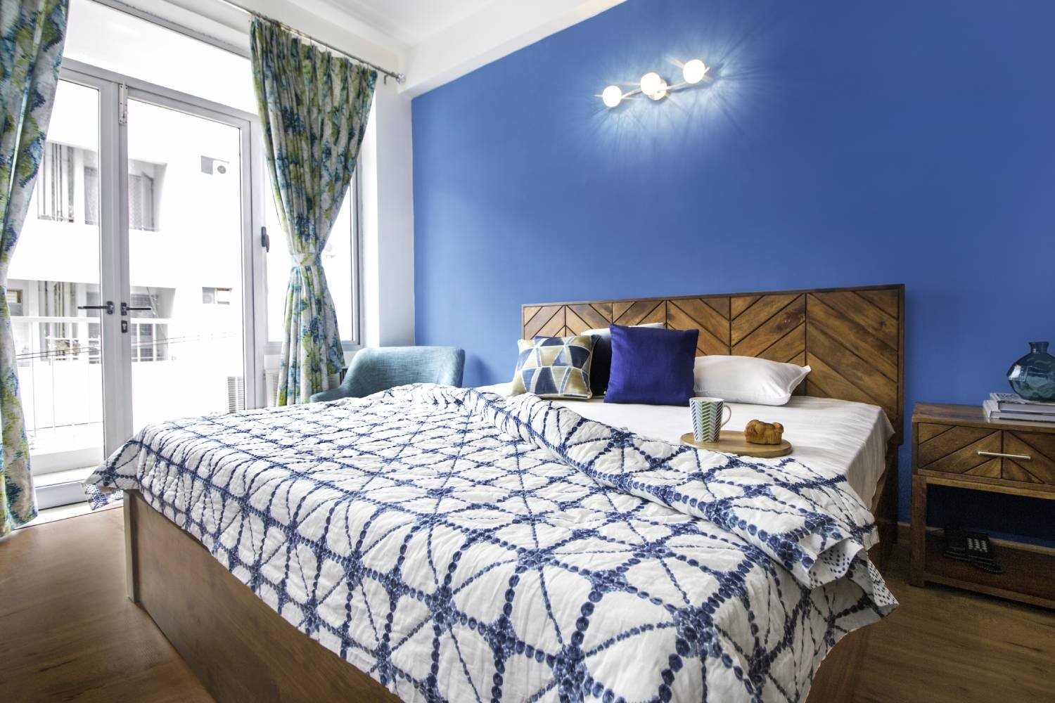 Contemporary 2BHK Flat Design with Cream and Burgundy Sofa