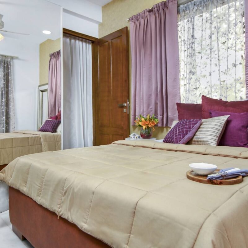 Contemporary 2BHK Flat Design with Hydraulic Storage Beds