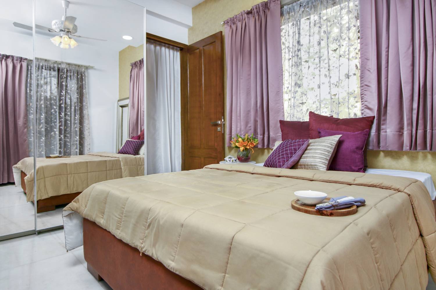 Contemporary 2BHK Flat Design with Hydraulic Storage Beds