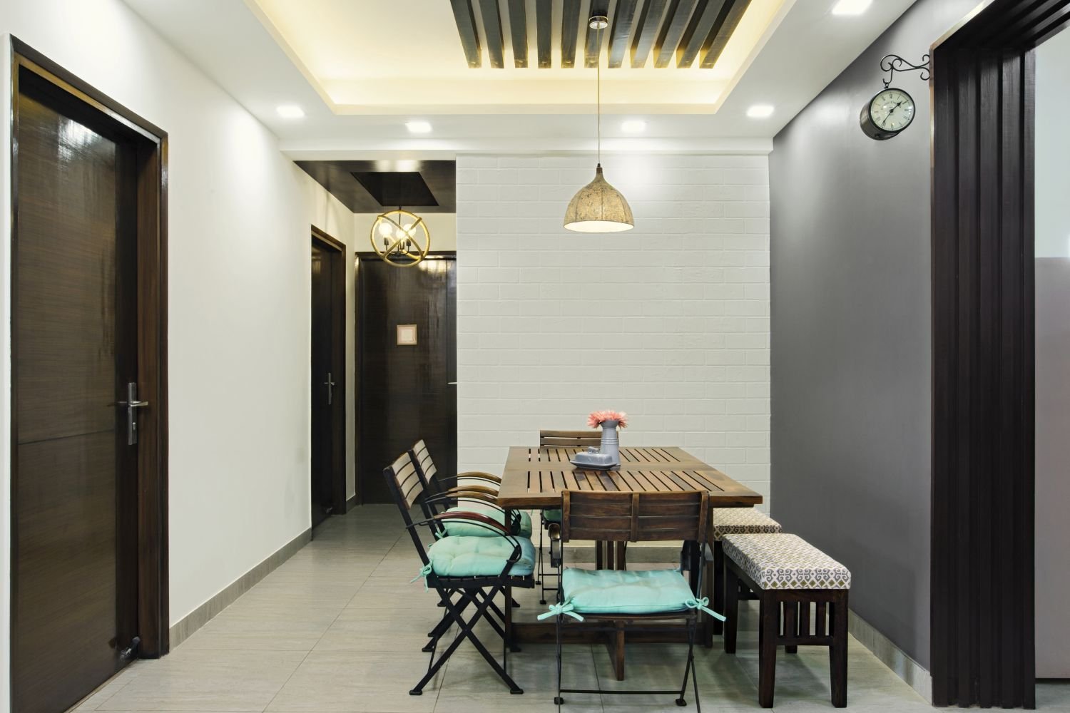 Contemporary 2BHK Flat Design with Inviting Balcony and Pop of Color in Living Room