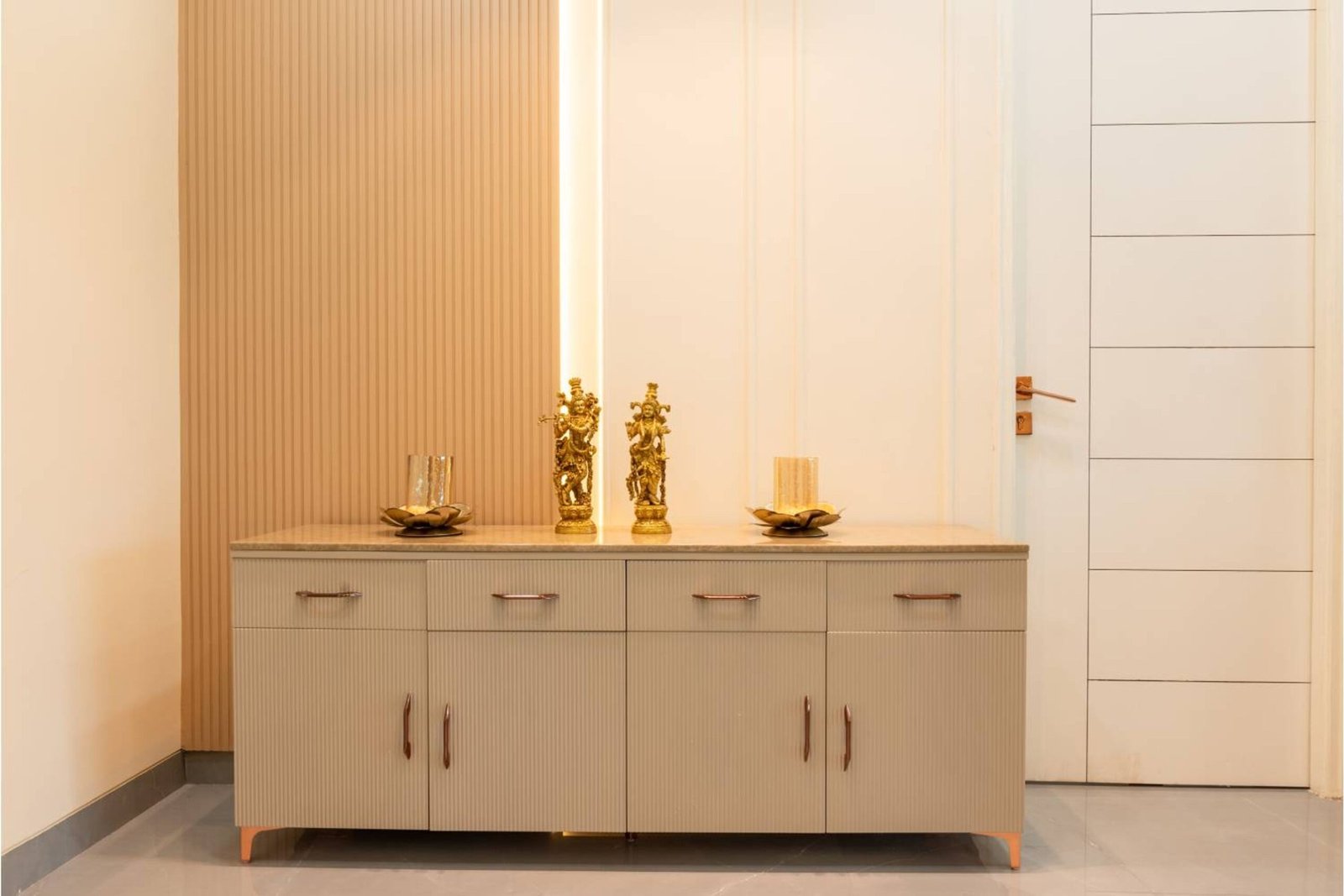 Modern Foyer Design with Cream Fluted Laminate Finish