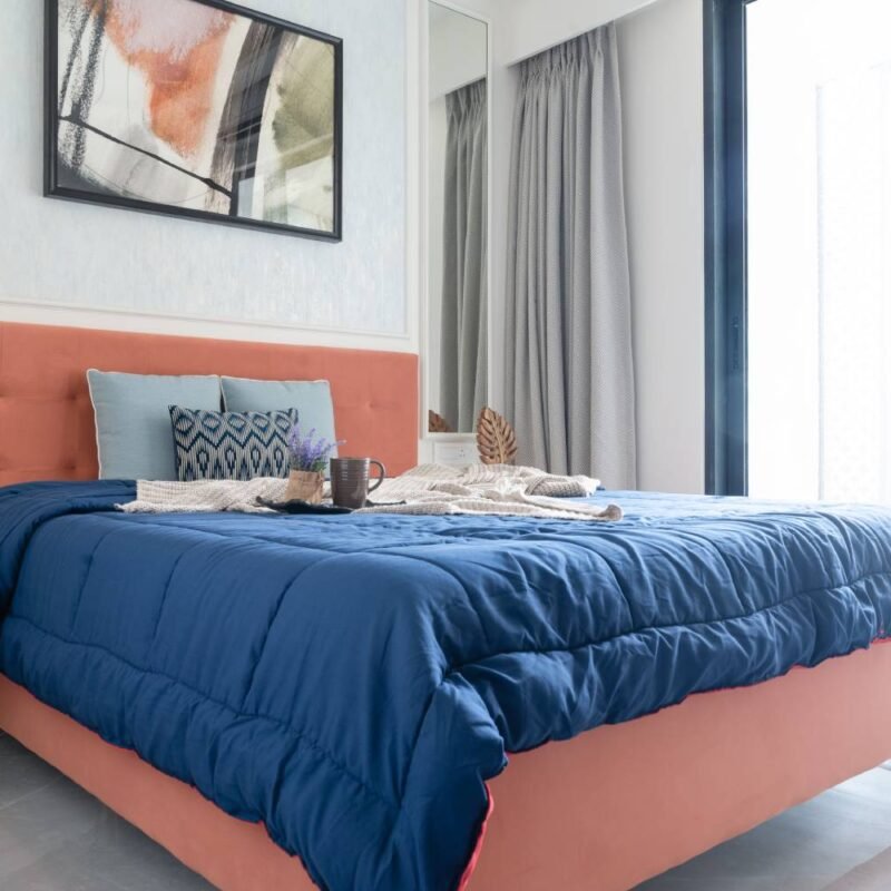 Modern Guest Bedroom Design With King Storage Bed and Wallpapered Wall