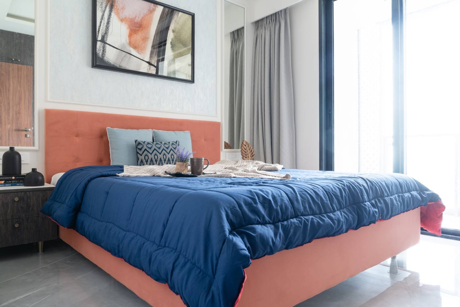 Modern Guest Bedroom Design With King Storage Bed and Wallpapered Wall