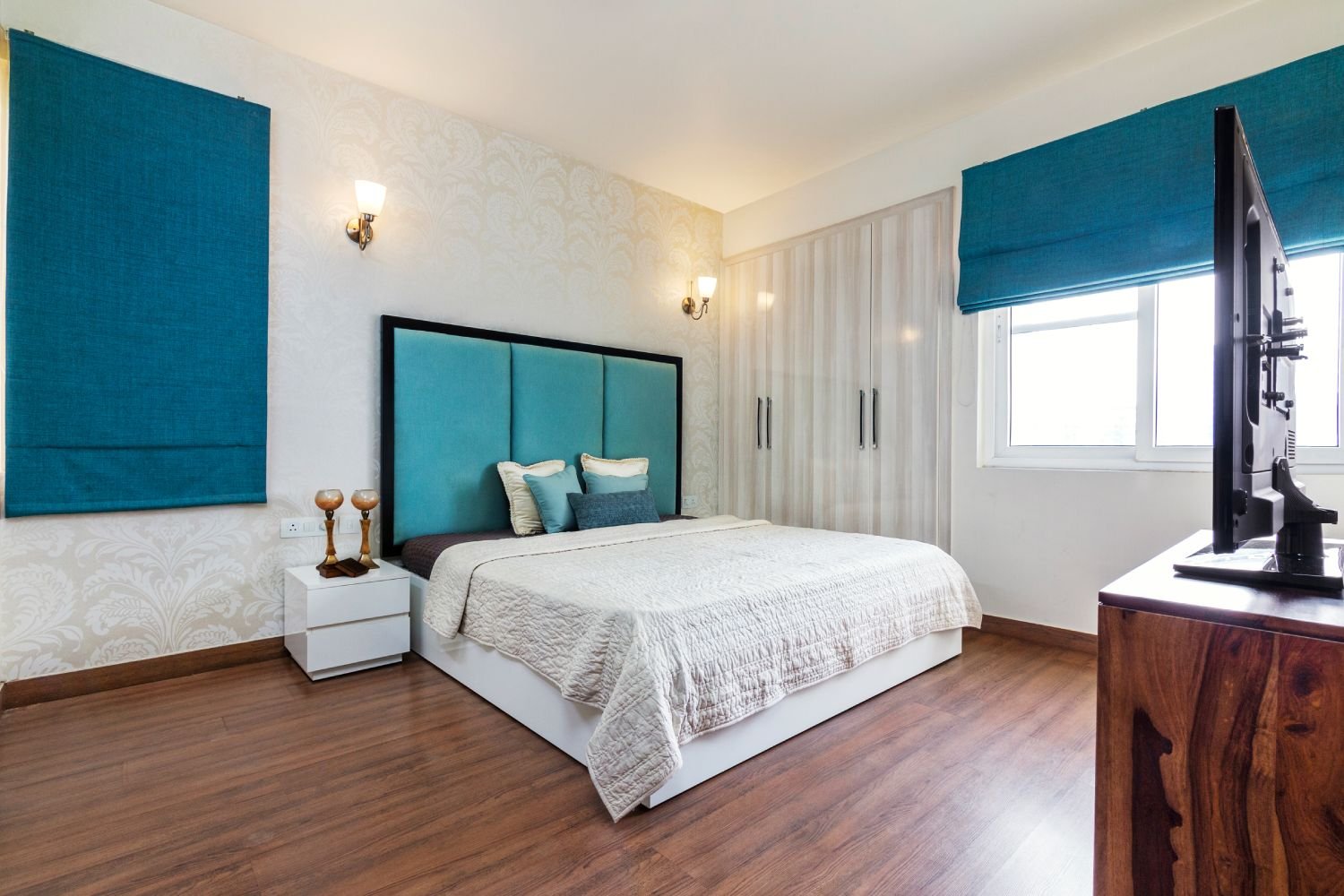 Modern 2BHK Flat Design with Blue Accents and Gold Highlights