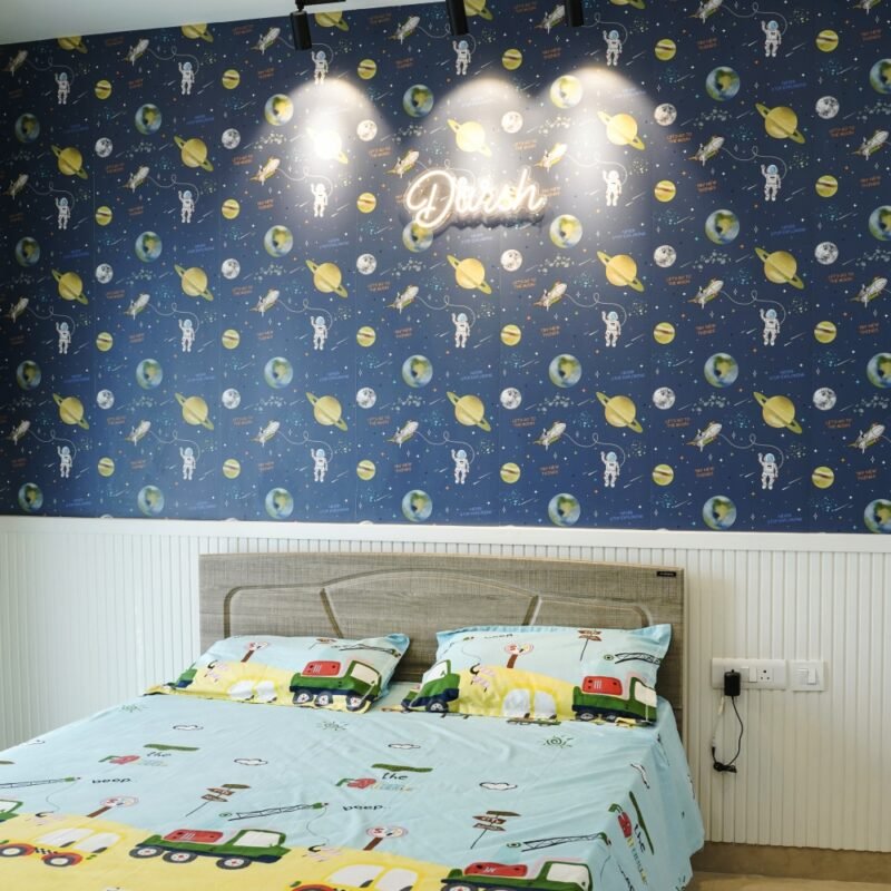 Modern Kids Bedroom Design with Wooden Headboard and Space-Inspired Decor