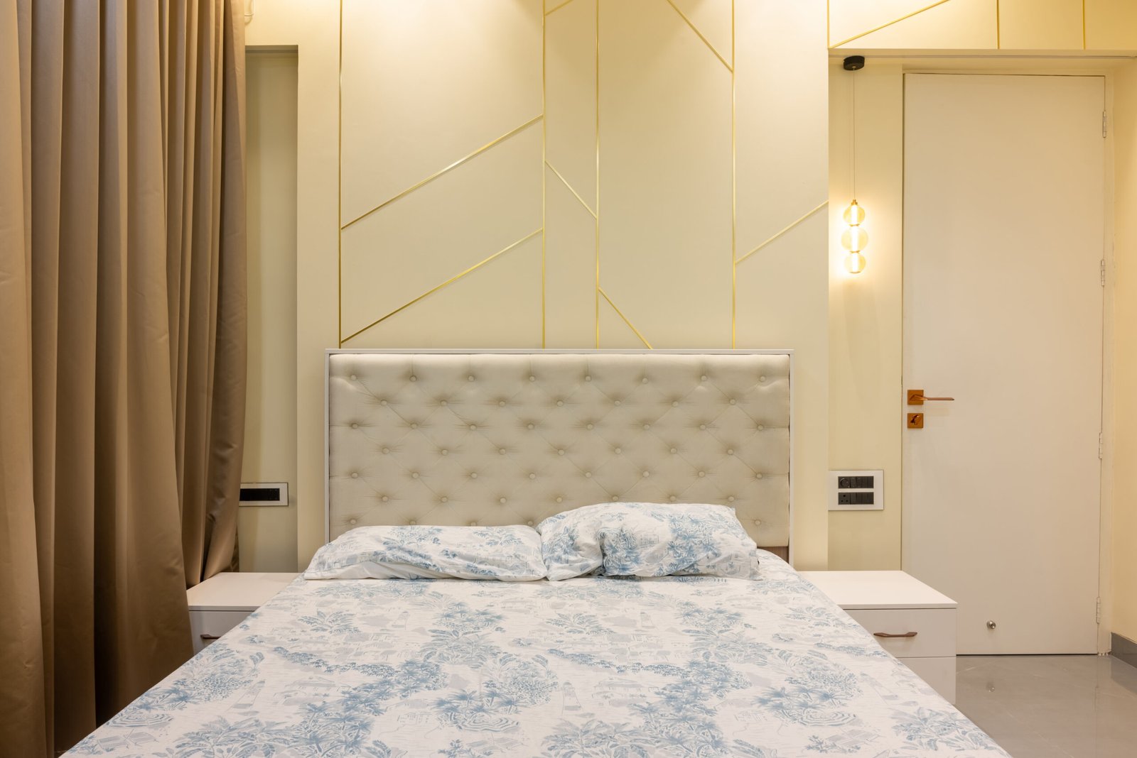 Modern Guest Bedroom Design with Queen Size Bed and Golden Trim