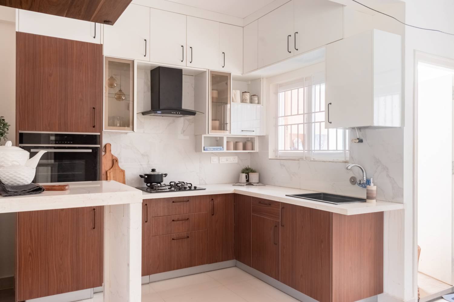 1BHK Flat Design in Modern Style with L-Shaped Kitchen