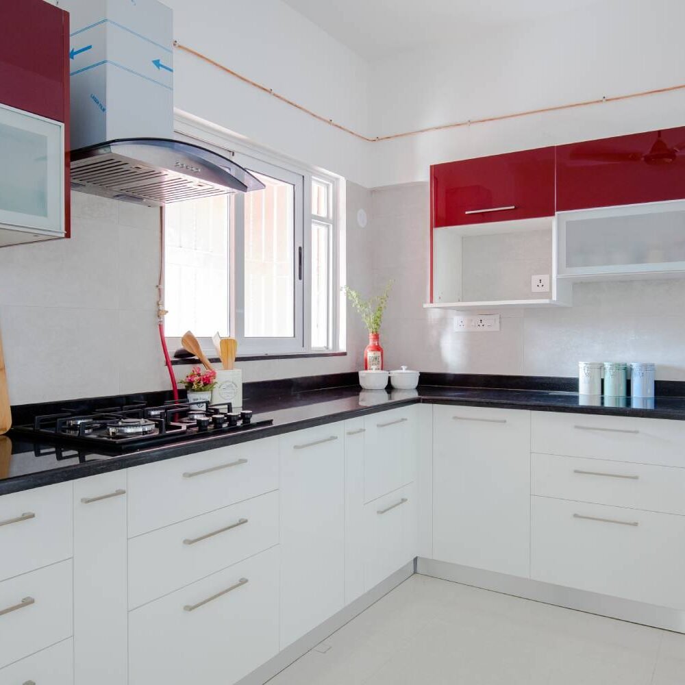 Contemporary 4BHK Flat Design with L-Shaped Kitchen