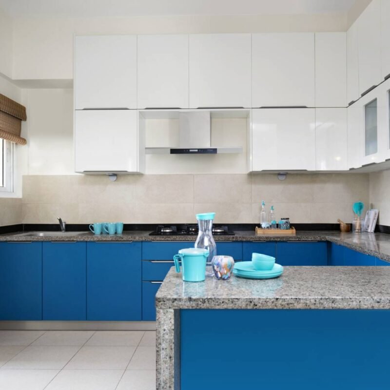 Modern 2BHK Flat with Spacious Peninsula Kitchen and Swing Wardrobes