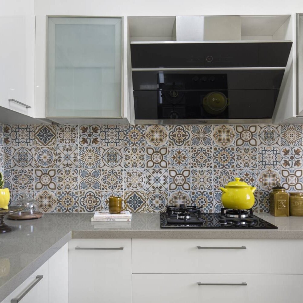 Contemporary 1BHK Flat Design with L-Shaped Kitchen and Stylish Dining Area