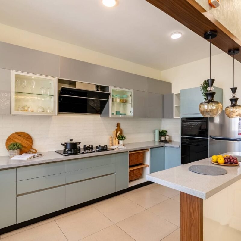 2BHK Contemporary Flat Design with Pastel Kitchen and Mirror Dining Area