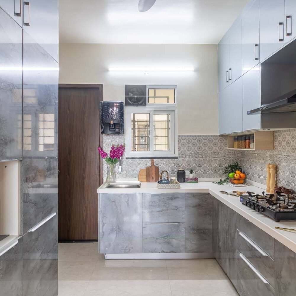 Contemporary 3BHK Flat Design with L-Shaped Kitchen and Stylish Wardrobes