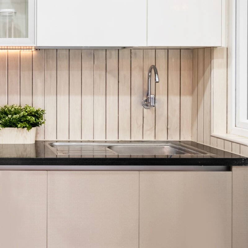 Minimal Stainless Steel Basin Wash With Drainboard And Beige Cabinets