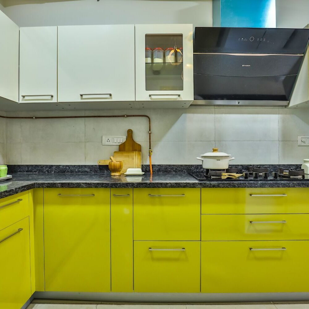 Contemporary 3BHK Flat Design with Cozy Living Room and L-Shaped Kitchen