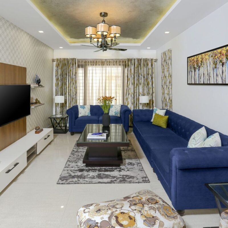Contemporary 3BHK Flat Interior Design with TV Backdrop and Glass Dining Area