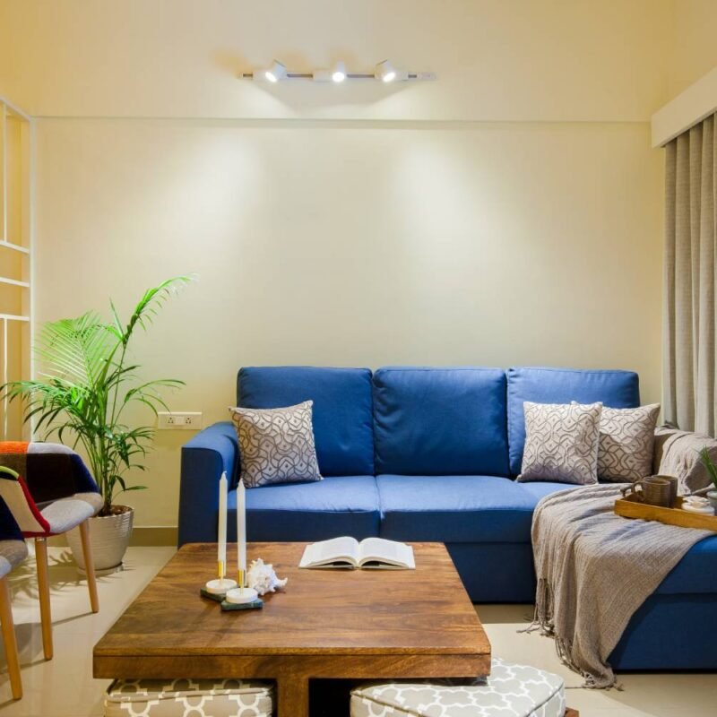 Contemporary 2BHK Flat Design with Bold Colors and Functional Wardrobe