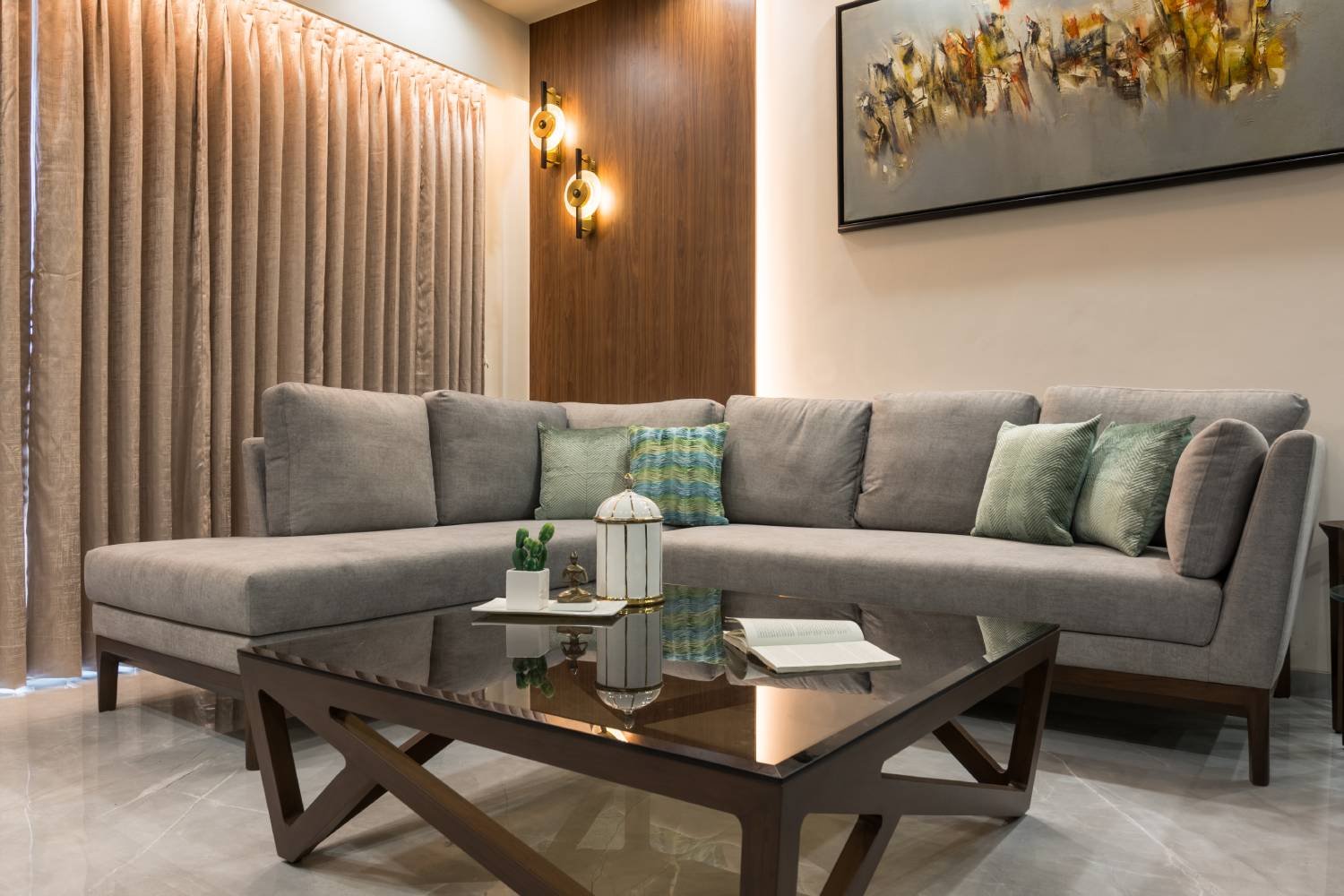 Contemporary Living Room Design with L-Shaped Grey Sofa and Glass Table