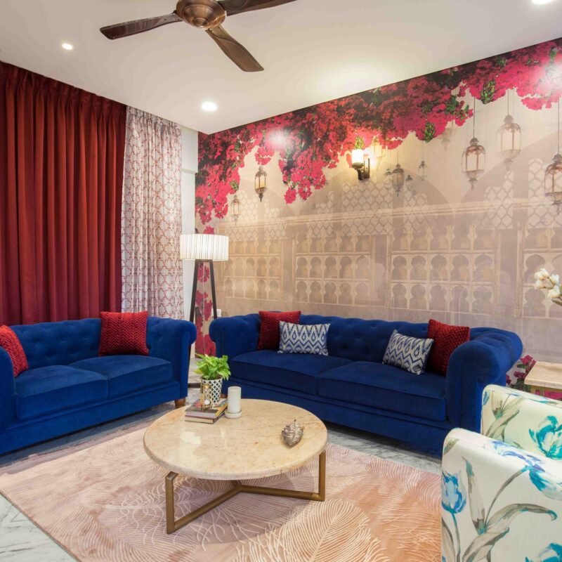 Traditional Living Room Design With Velvet Sofas and Marble Coffee Table