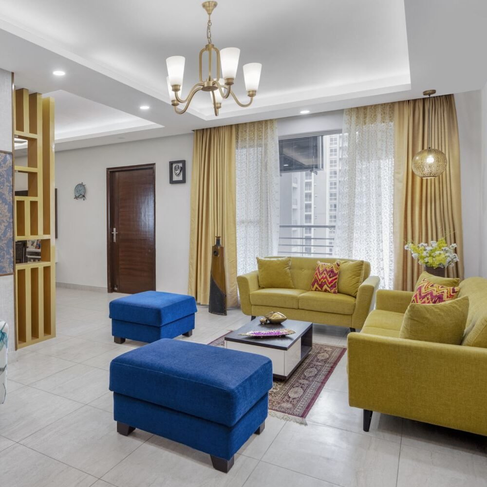 Contemporary 3BHK Flat Design with Mirrored Wardrobe and Neutral Colour Scheme