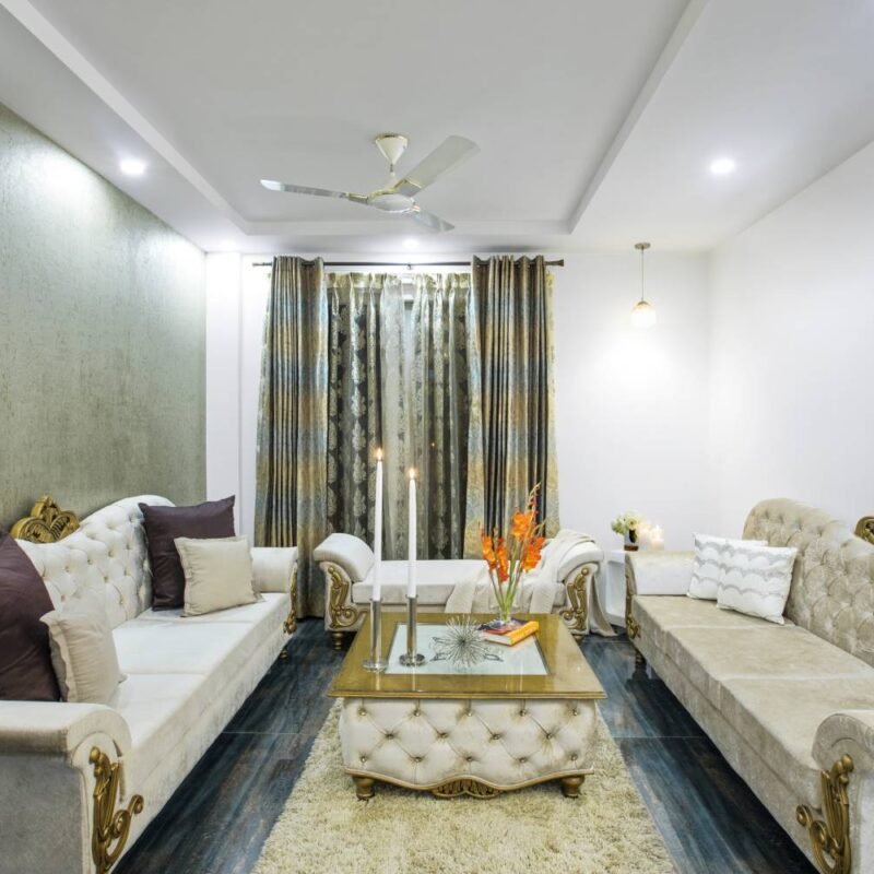 Modern 3BHK Flat Design with Chesterfield Sofa and Wooden Panelling