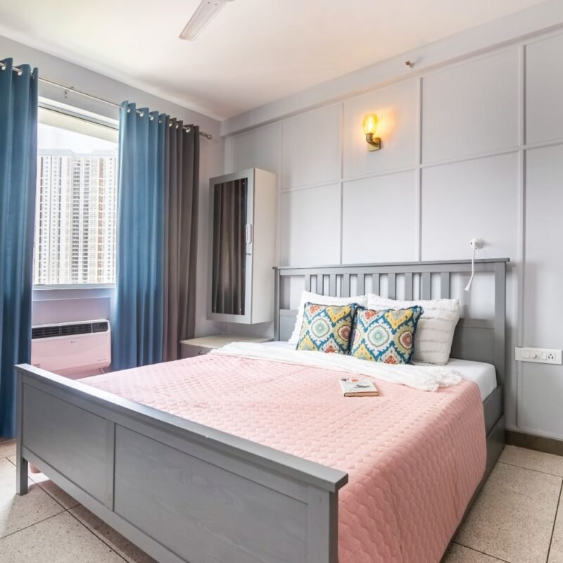 2BHK Contemporary Flat Design with U Shaped Kitchen and Wall Trims