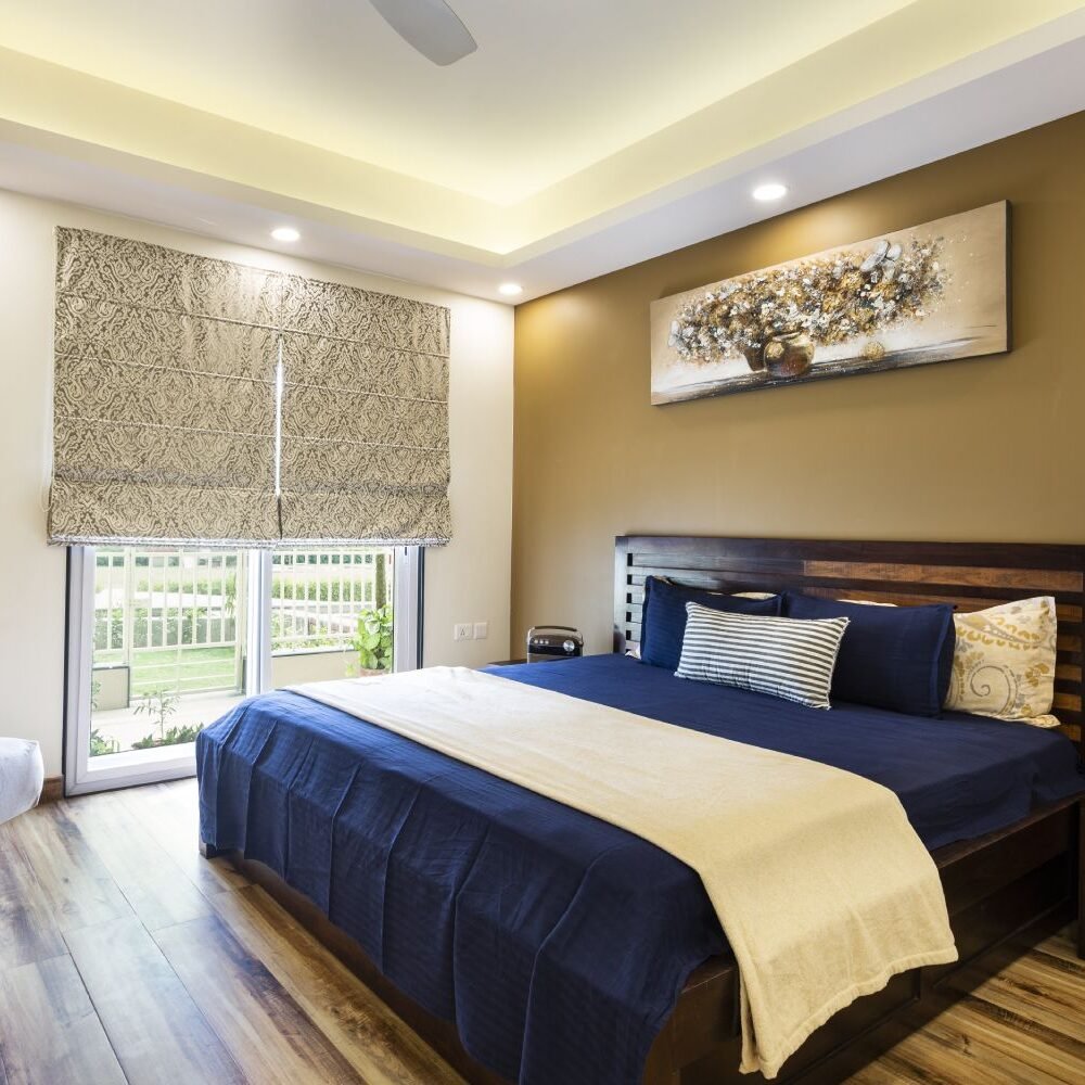 Contemporary 2BHK Flat Design with Open Kitchen and Neutral-Toned Bedrooms