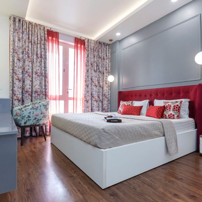 2BHK Contemporary Flat Design with Parallel Kitchen and Vibrant Living Room