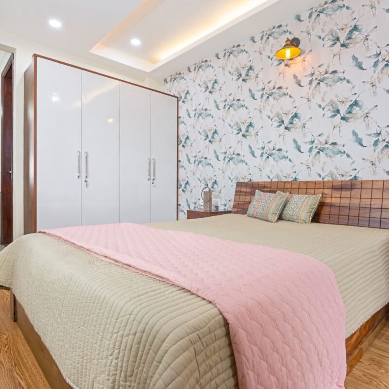 Contemporary 2BHK Flat Design Featuring L-Shaped Sofa