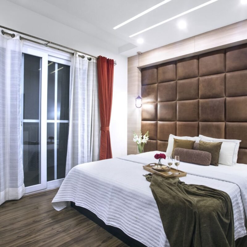 Contemporary 3BHK Flat Design with Blue Bedroom Walls