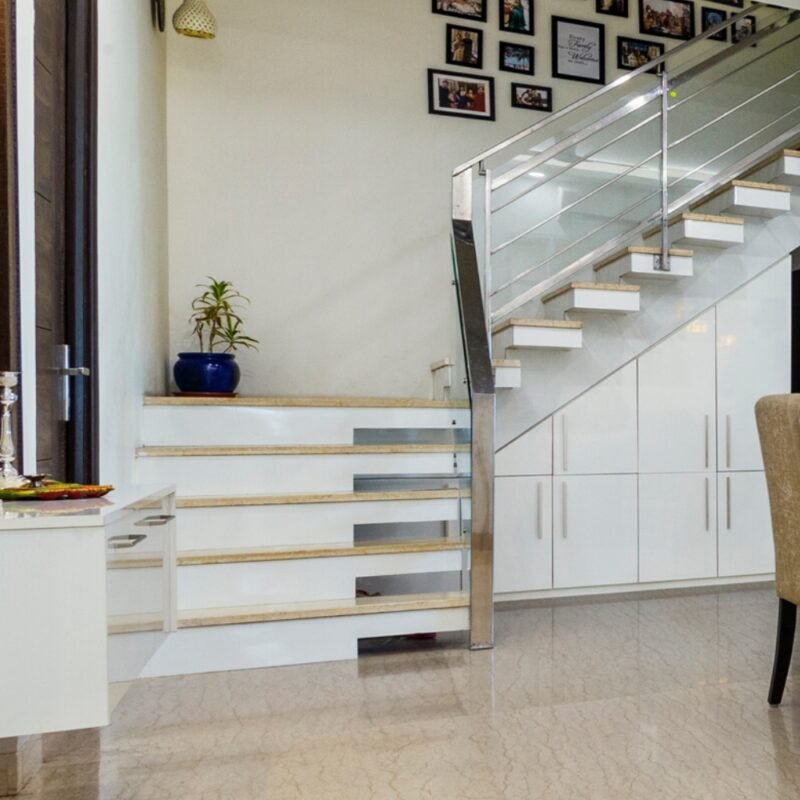 Modern L-Shaped Staircase Design in Concrete and Wood