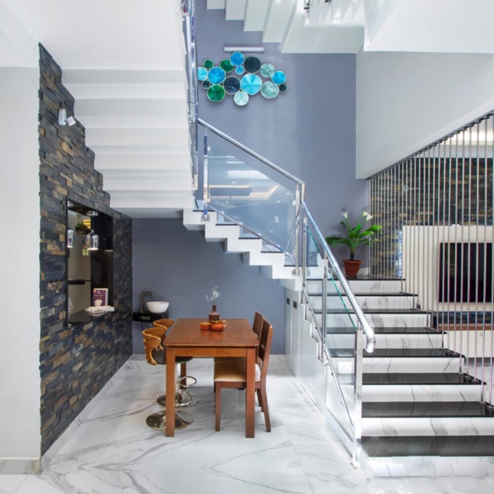 Modern U-Shaped Concrete Staircase Design with Two Landings