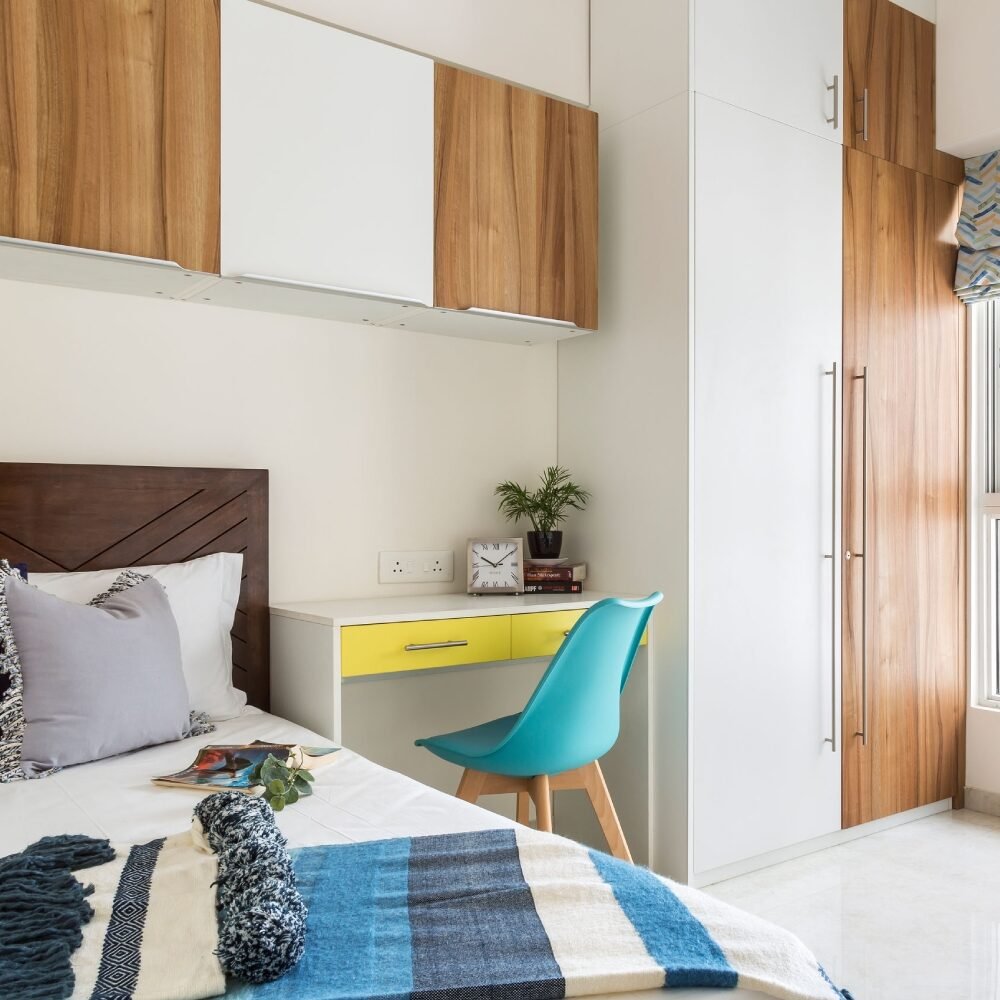 Innovative Space Saving Design with Shared Bedhead Wall for Wall Storage