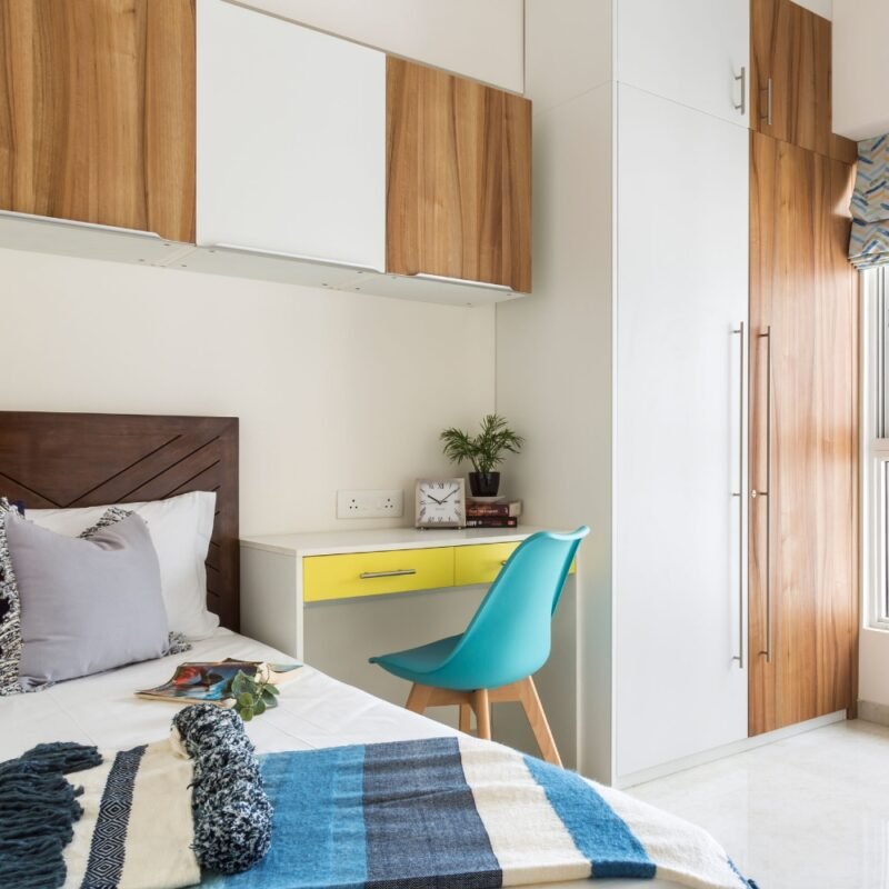 Innovative Space Saving Design with Shared Bedhead Wall for Wall Storage