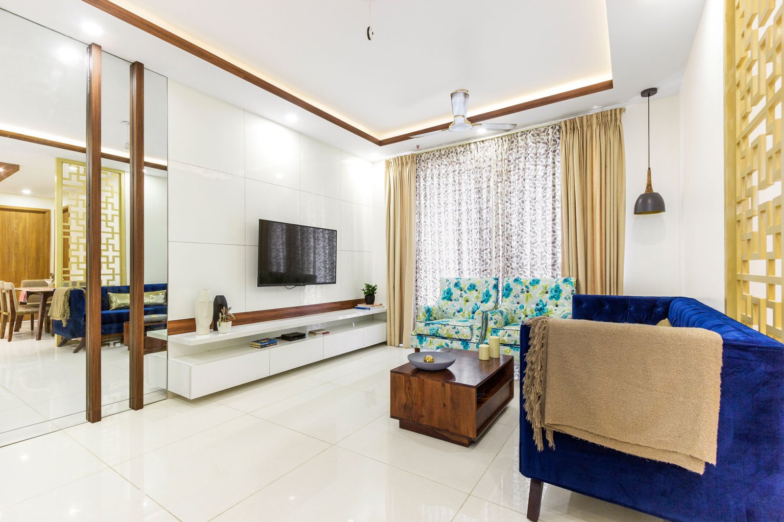 Glossy Minimal TV Unit Design With Shelves and Cabinets