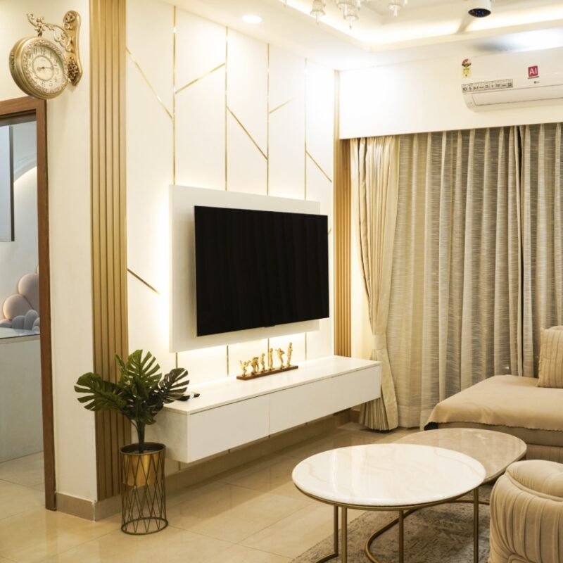 Contemporary Wall-Mounted TV Unit Design with White and Gold Accents